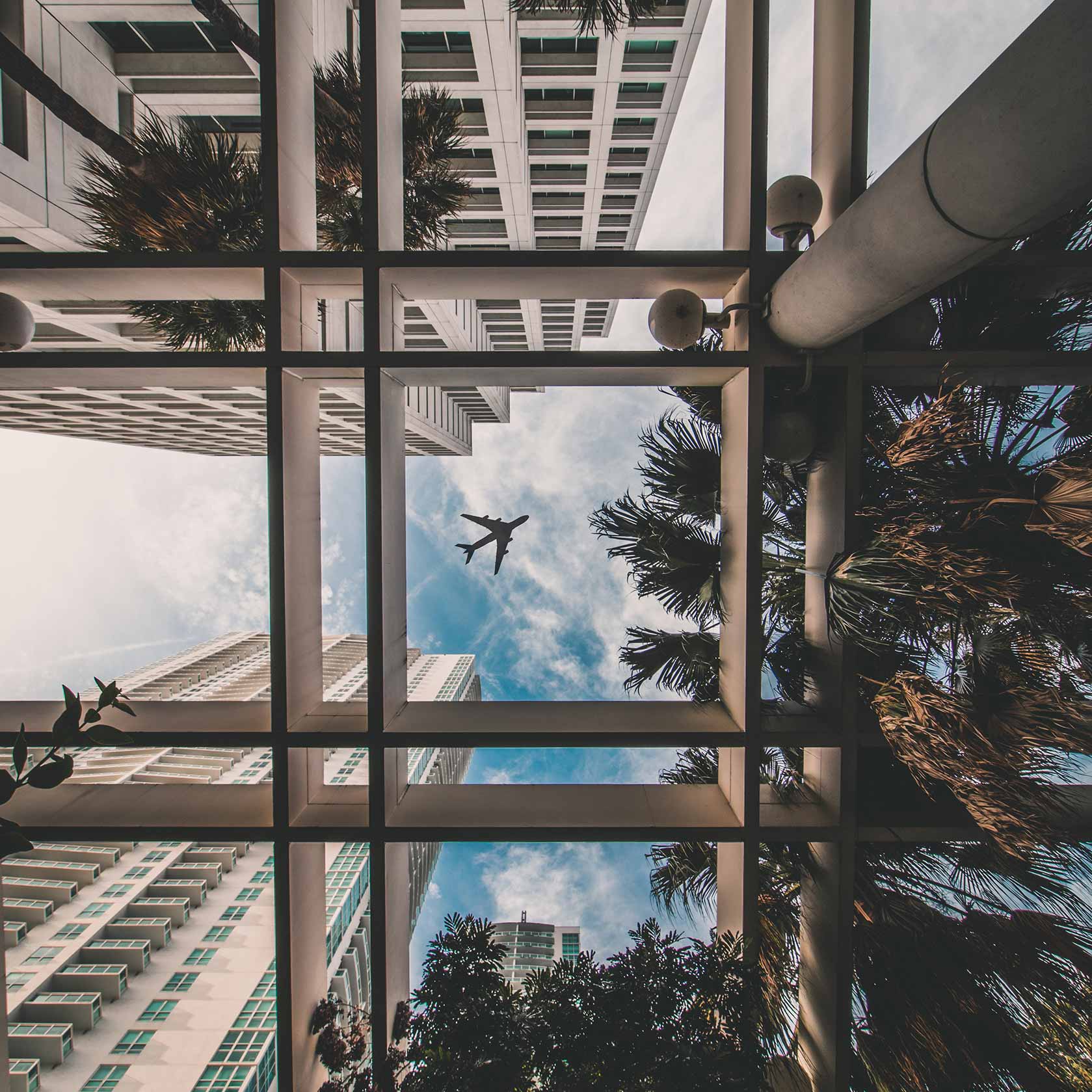 A plane flying over Miami